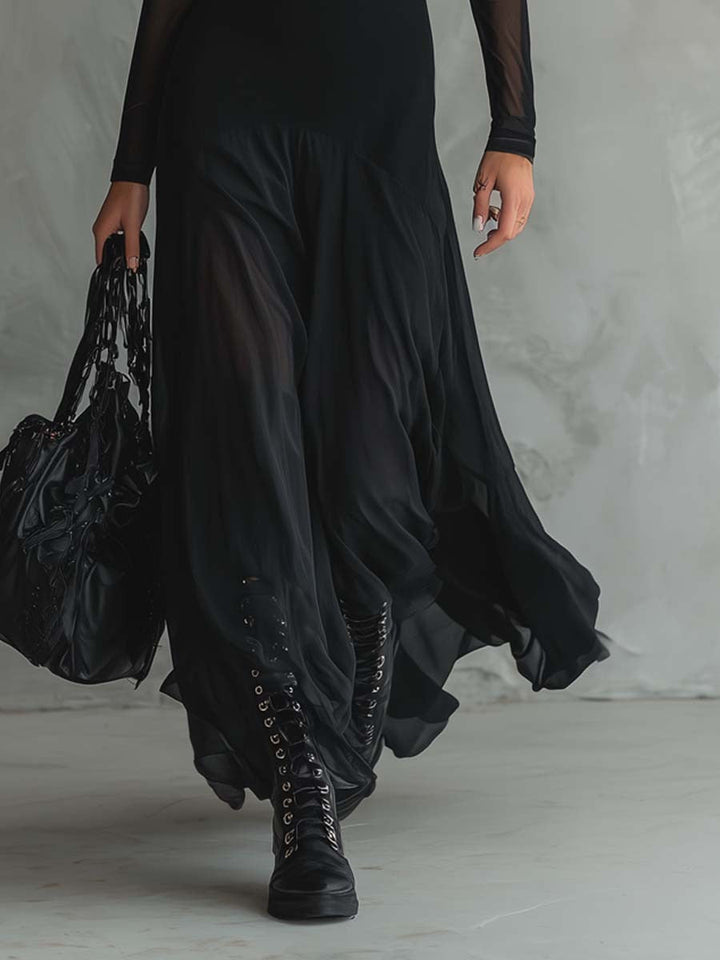 Comfortable & elegant women's black flowy maxi dress. Versatile style for evening events or a chic special occasion look.