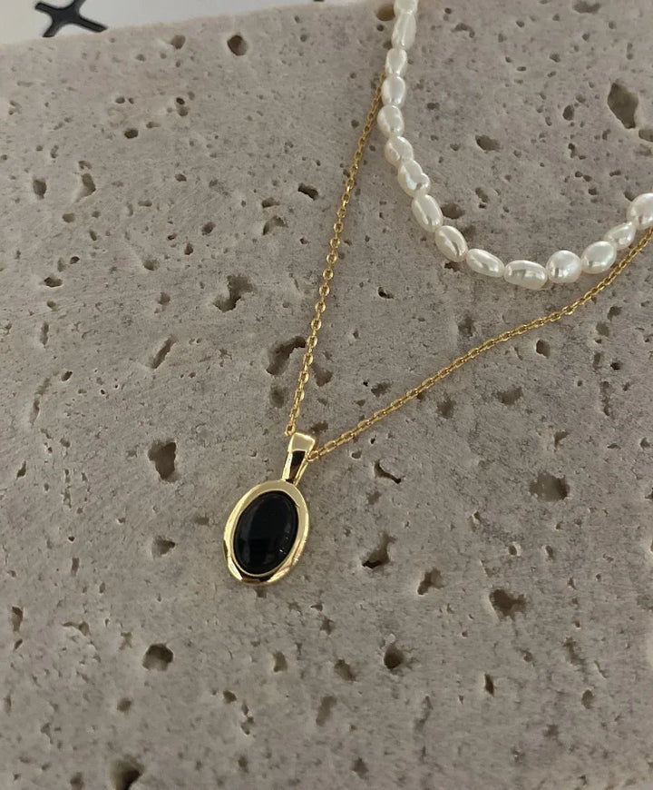 Versatile women's black onyx & pearl layered necklace set, elegant jewelry for any occasion.