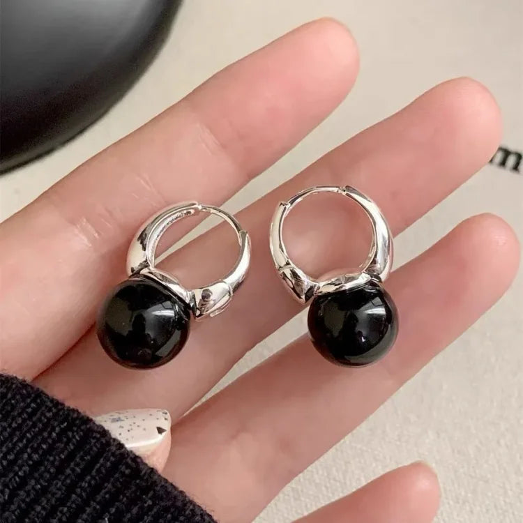 Stylish women's black onyx stud earrings, natural gemstone jewelry for a versatile & classic look.
