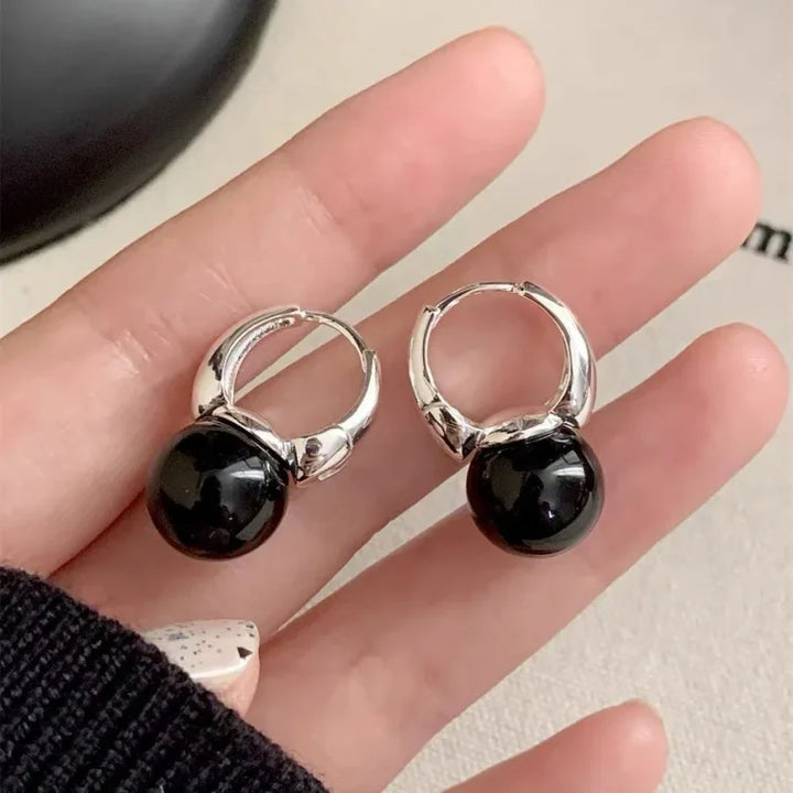 Stylish women's black onyx stud earrings, natural gemstone jewelry for a versatile & classic look.