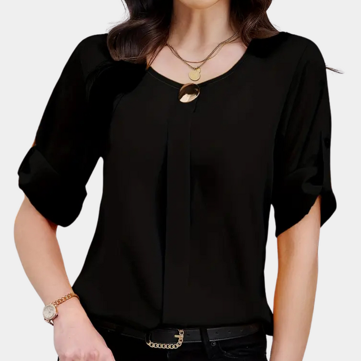 Elegant women's black pleated blouse with long sleeves, perfect for office or chic casual wear. Loose fit for comfort.