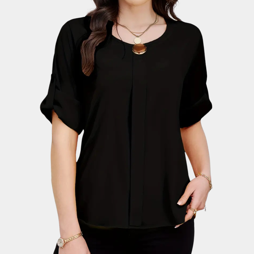 Women's airy black pleated blouse, a stylish long-sleeve top for elegant office wear or chic everyday fashion. Loose and comfortable.