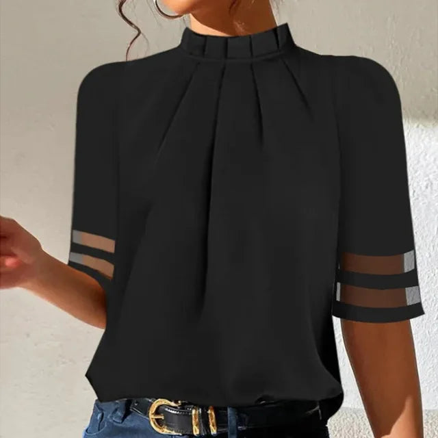Stylish women's black pleated top featuring elegant pleats, ideal for a chic look. Versatile fashion for any occasion.