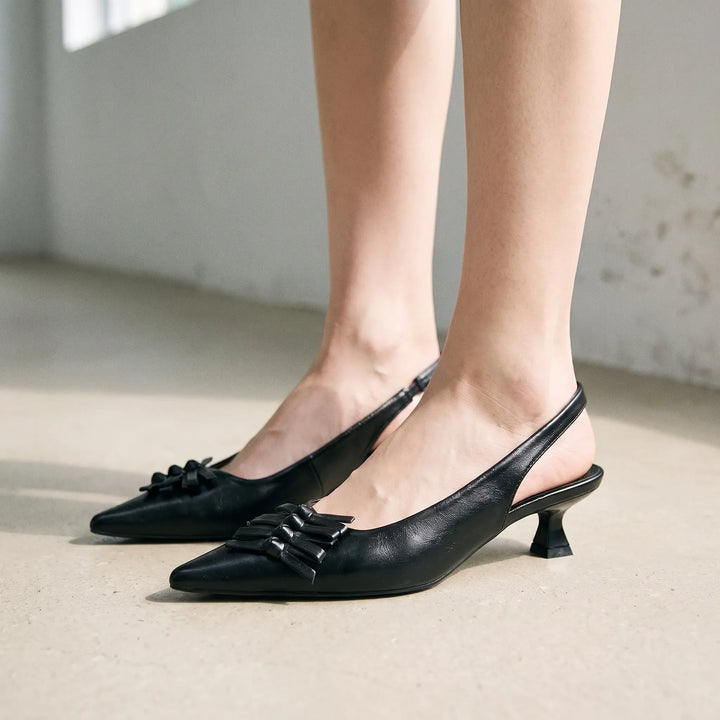 Elegant women's black pointed toe slingback kitten heels, ideal for dress shoes, office wear & formal events.