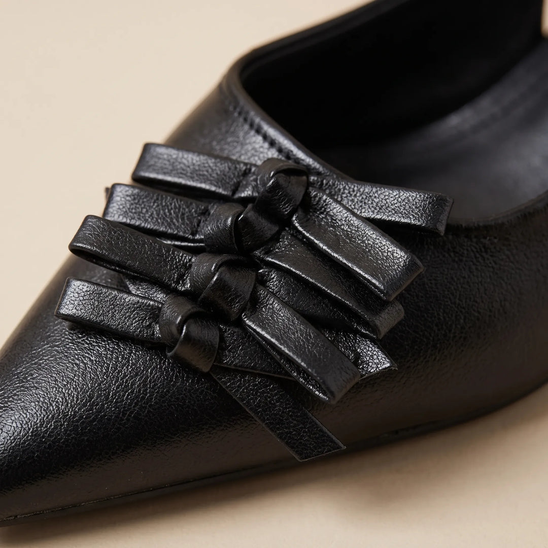 Classic pointed toe slingback kitten heels for women. Versatile dress shoes, great for sophisticated office or party outfits.