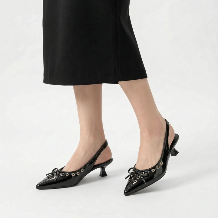 Modern women's nude pointed toe slingback kitten heels. Comfortable evening shoes & professional office wear footwear.