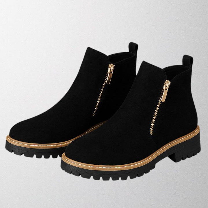 Full view of women's sophisticated round toe side zip shoes, designed for office and evening elegance.