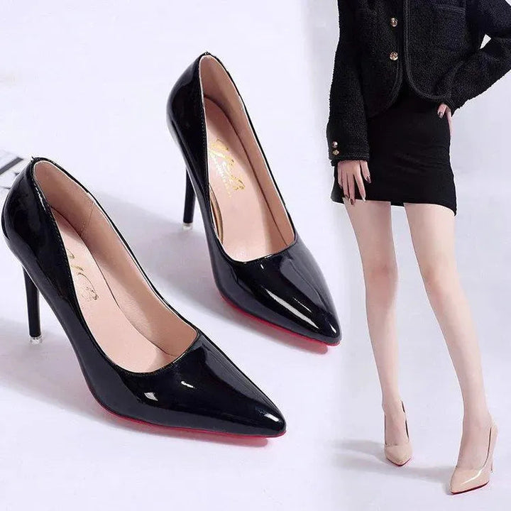 Elegant women's black stiletto pumps with pointed toe for office or formal events.