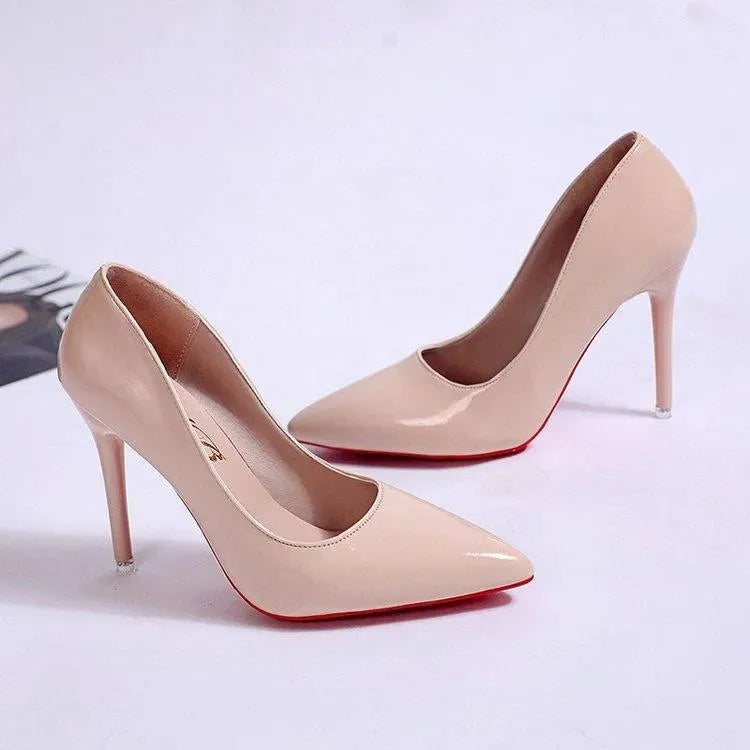 Modern women's stiletto pumps, elegant pointed-toe design, versatile heel heights, chic black.