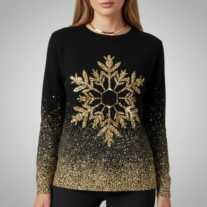 Winter fashion black sweater with intricate white snowflake print, ideal for a cozy look.