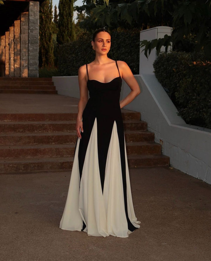 Stunning Black & White Contrast Evening Maxi Dress. Chic formal gown for women, perfect for weddings.