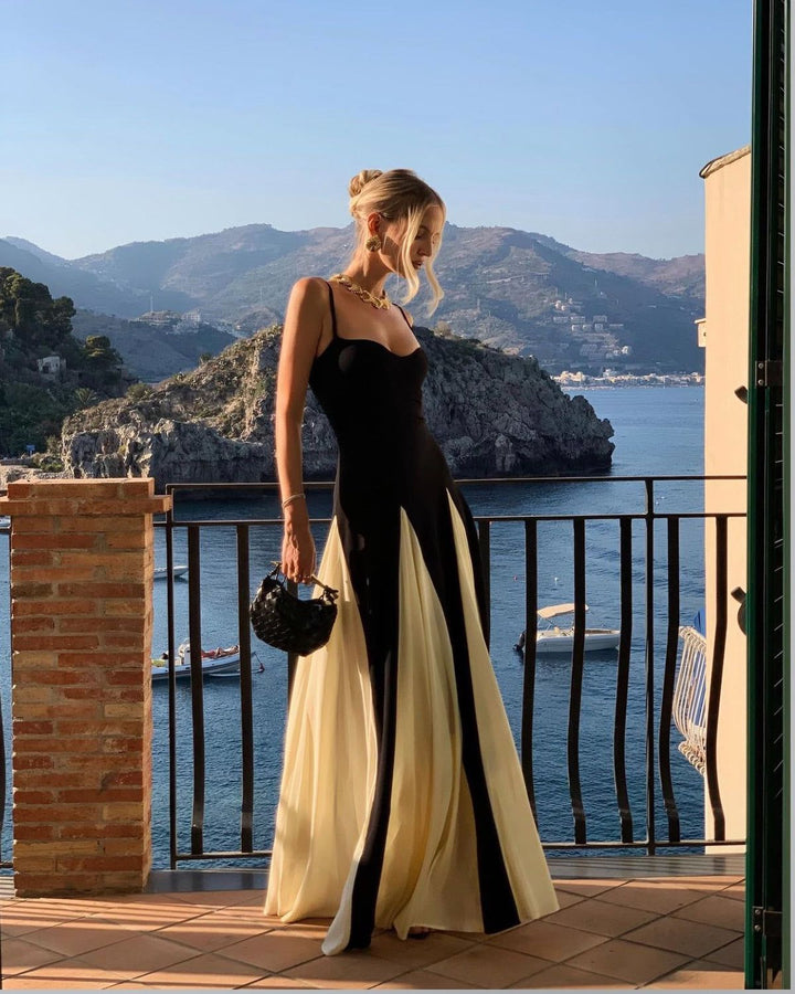 Sleeveless Black & White Formal Maxi Dress. Elegant women's design, suitable for wedding guests.