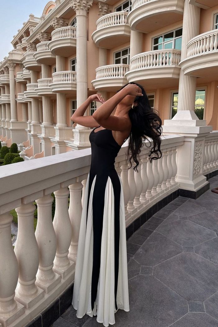 Sleek Black and White Contrast Wedding Guest Dress. Women's elegant sleeveless formal maxi gown.