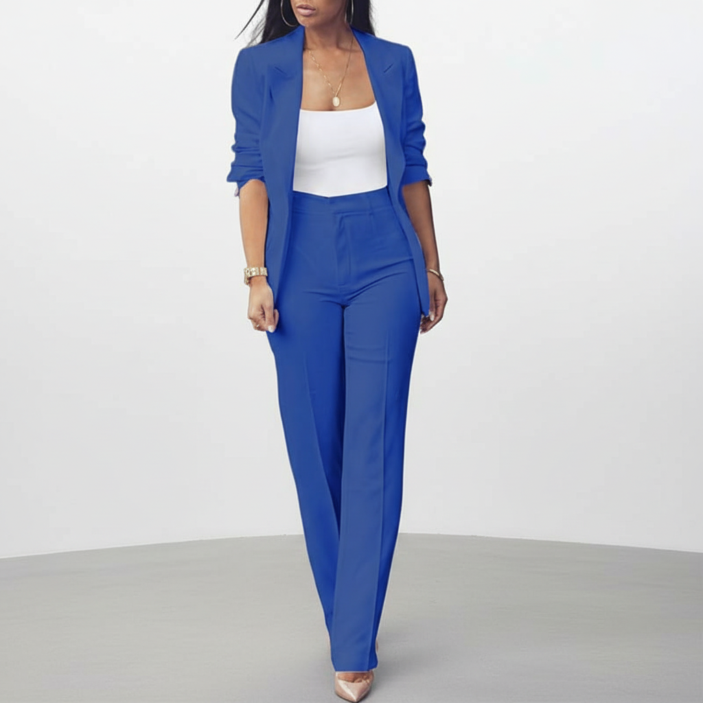 Classic women's two-piece outfit featuring an elegant blazer and streamlined trousers.