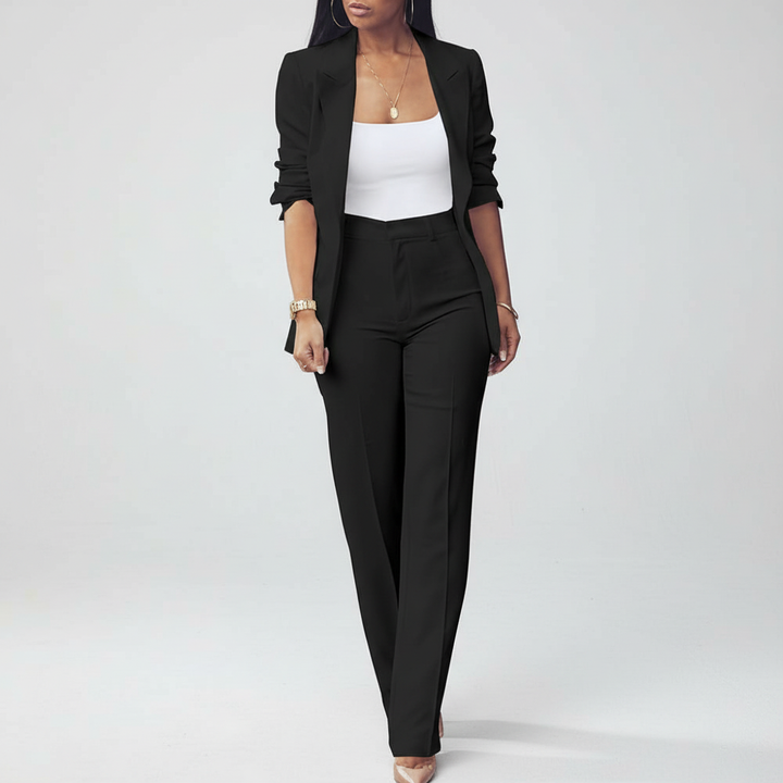 Women's sophisticated blazer and slim-fit trousers set, ideal for professional business attire.