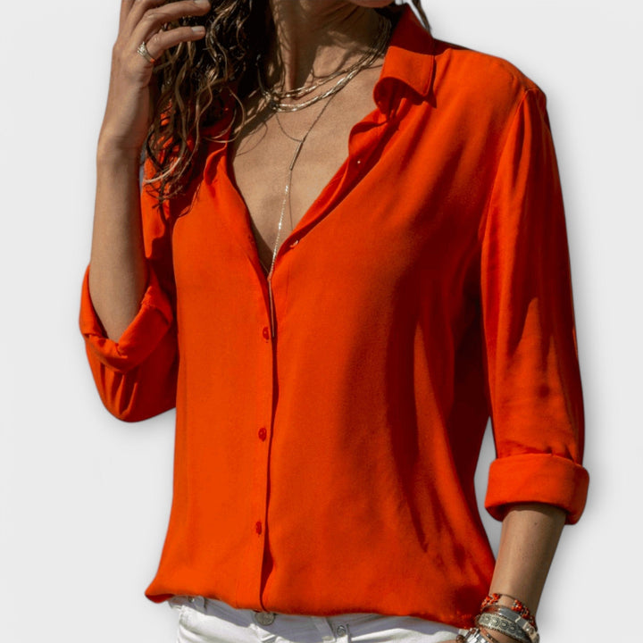 Sophisticated women's elegant blouse. Perfect for business casual or stylish evening wear.