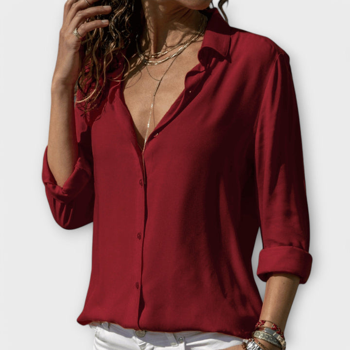 Chic women's blouse, ideal for office or evening. Stylish & sophisticated business casual top.