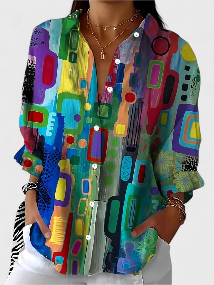 Elegant women's blouse with chic geometric pattern. Versatile long sleeve top perfect for workwear or a dressy look.