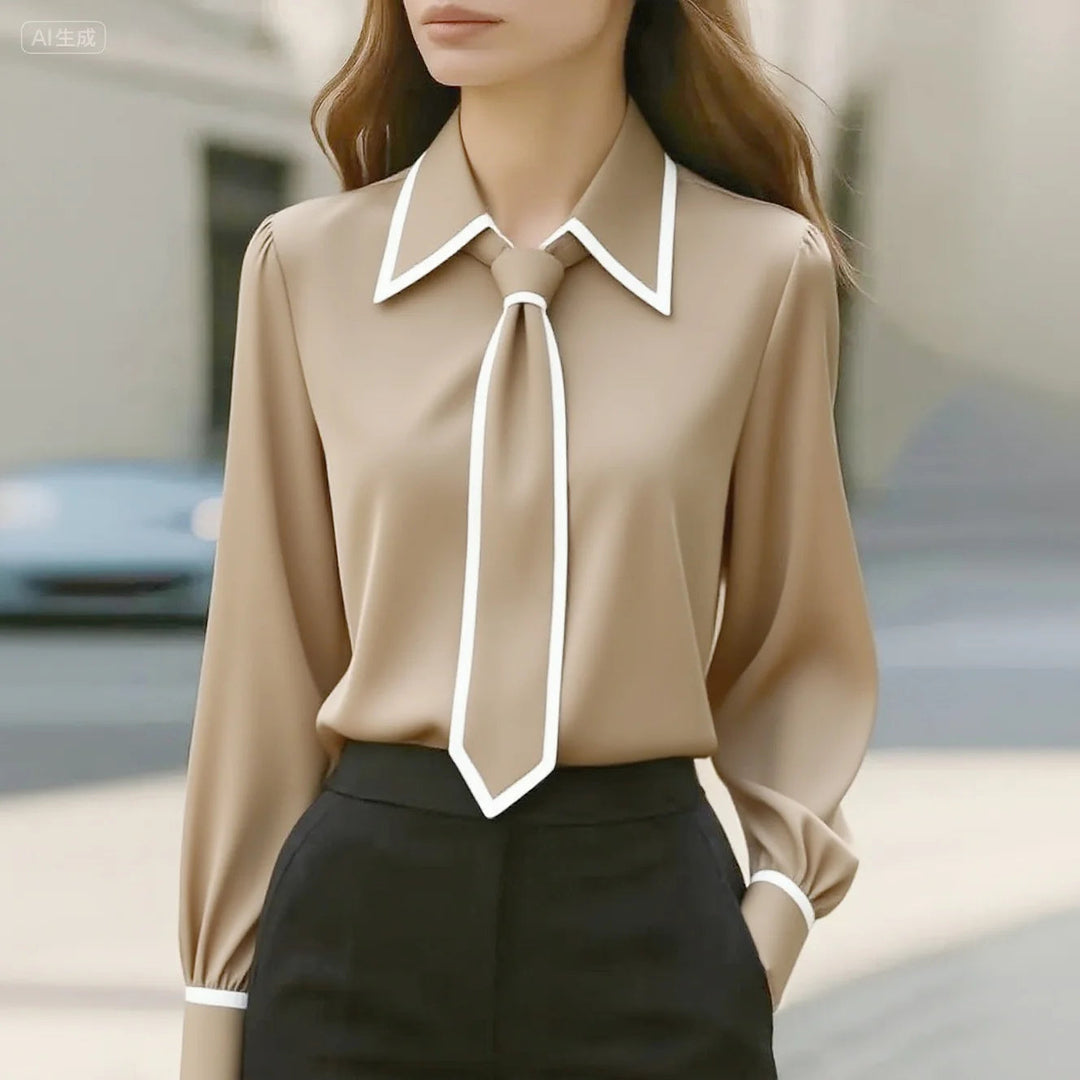 Women's elegant tie neck blouse, long sleeve. Features stylish contrast piping, ideal for office chic & formal wear.