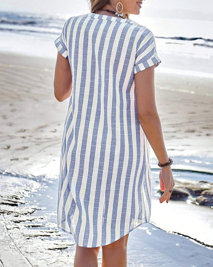 Blue striped V-neck shirt dress for women. An elegant & versatile outfit, ideal for office, casual chic, or day wear.