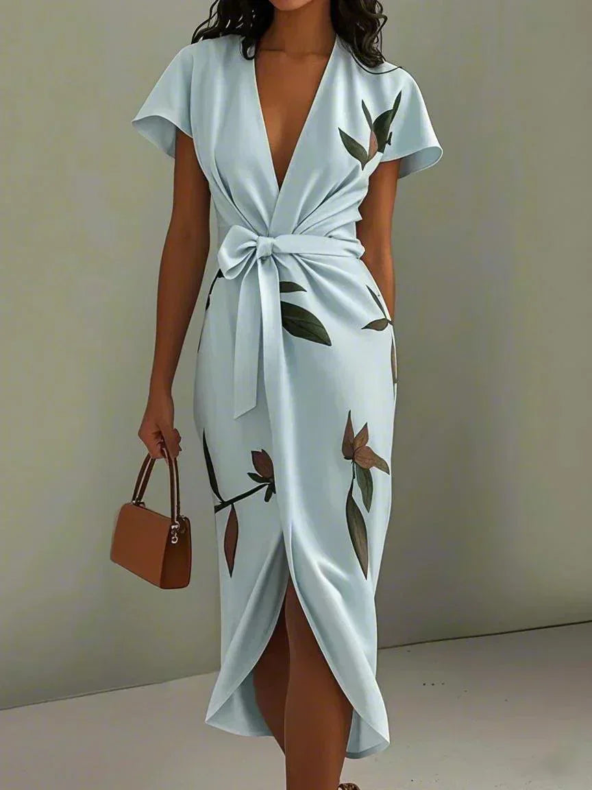 Stylish botanical floral midi dress for women, featuring a flattering V-neck, flutter sleeves & a chic bow-tie, ideal for special occasions.