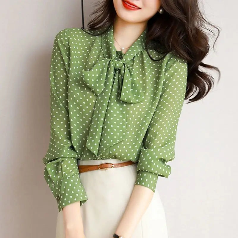 Green elegant women's bow blouse featuring a chic shawl collar, ideal for stylish office fashion.
