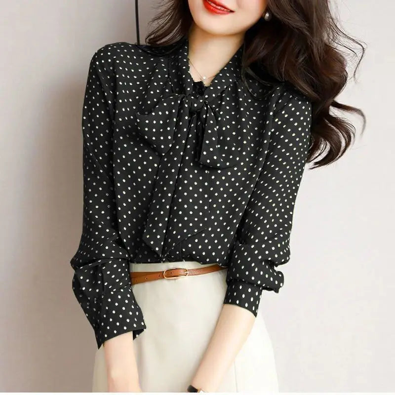Chic women's bow blouse featuring an elegant shawl collar, a sophisticated and stylish ladies' fashion top.