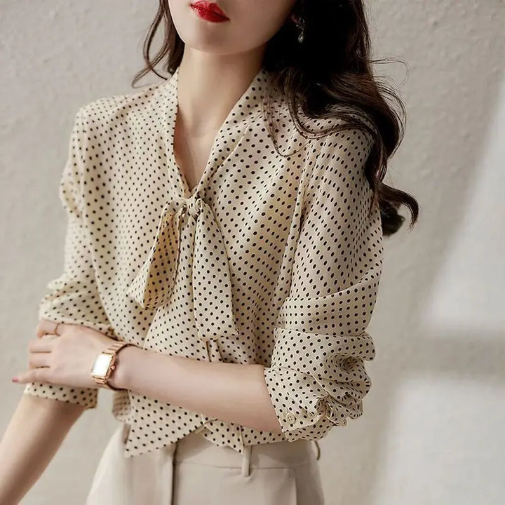 Stylish elegant women's bow blouse with shawl collar. Available in green, red, black, and apricot.