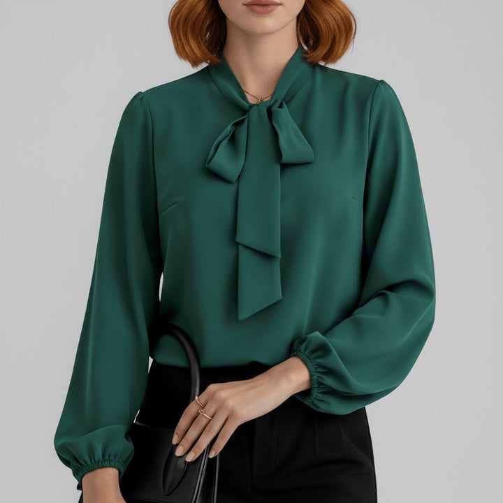 Versatile women's puff sleeve blouse with a chic bow tie neck, perfect for sophisticated workwear.