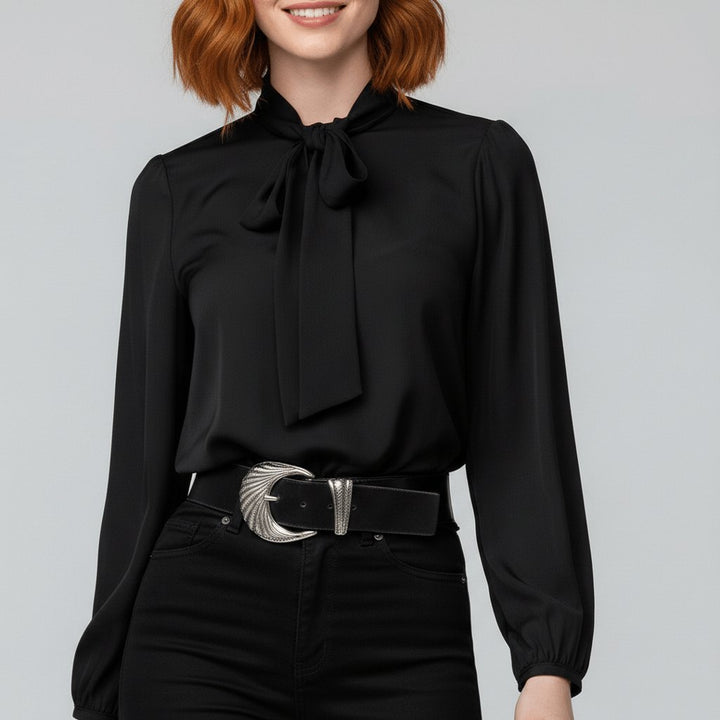 Fashionable women's elegant blouse with a graceful bow tie neck and trendy puff sleeves.