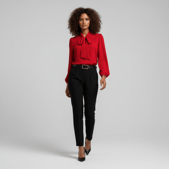 Chic women's business casual top: an elegant puff sleeve blouse with a flattering bow tie neck.
