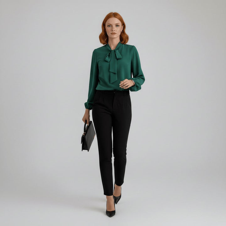 Stylish women's long sleeve blouse featuring puff sleeves and a sophisticated bow tie neck.