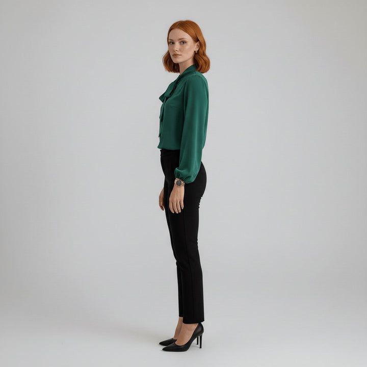Sophisticated women's apparel: elegant blouse with a timeless bow tie neck and puff sleeves.