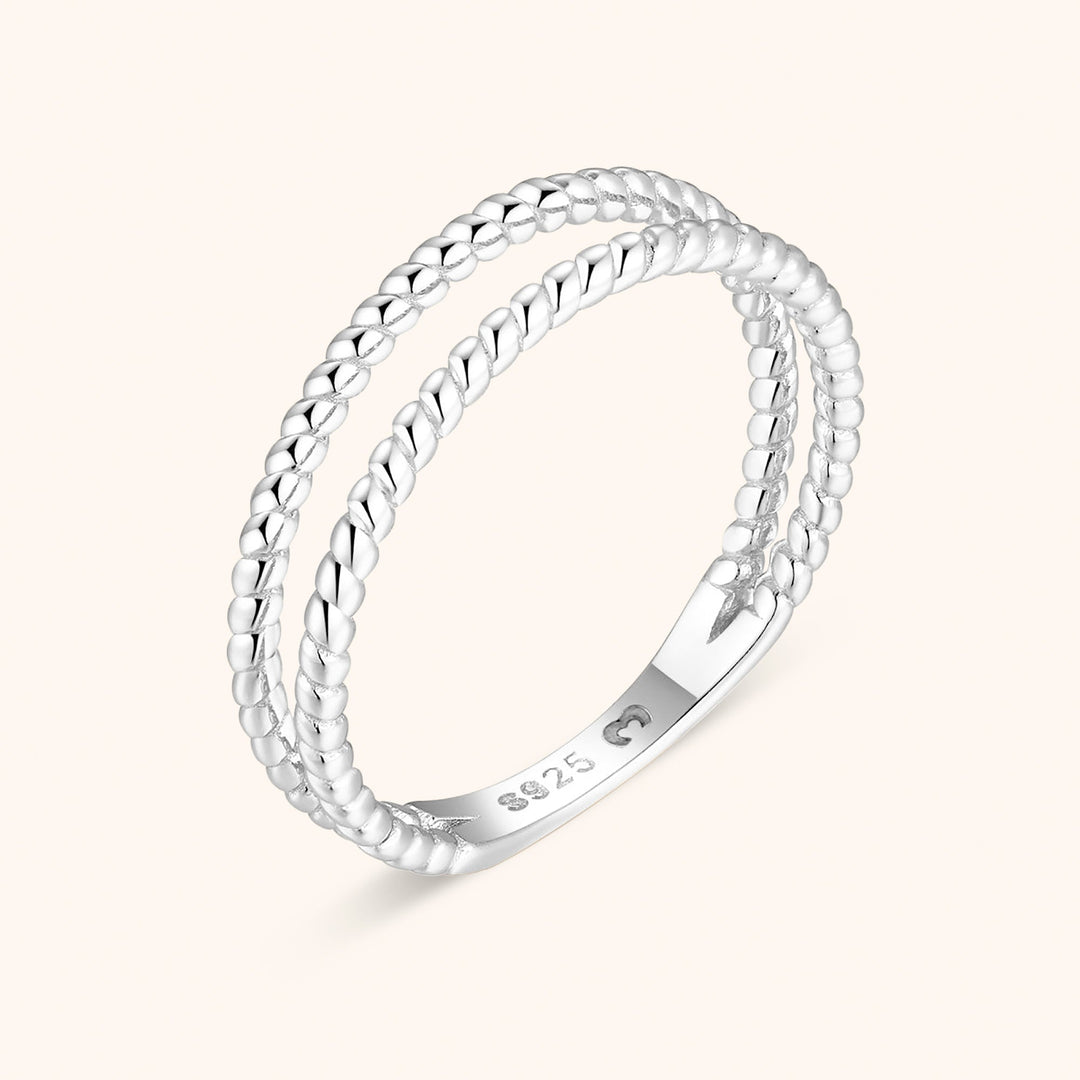 Fashionable women's statement ring: braided double design, made with premium sterling silver & elegant gold plating.