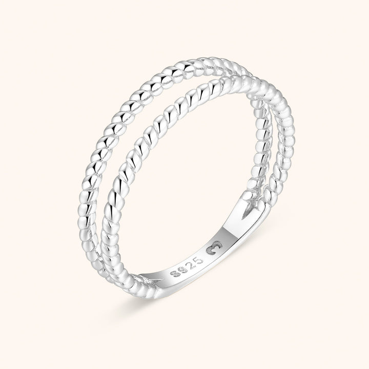 Fashionable women's statement ring: braided double design, made with premium sterling silver & elegant gold plating.