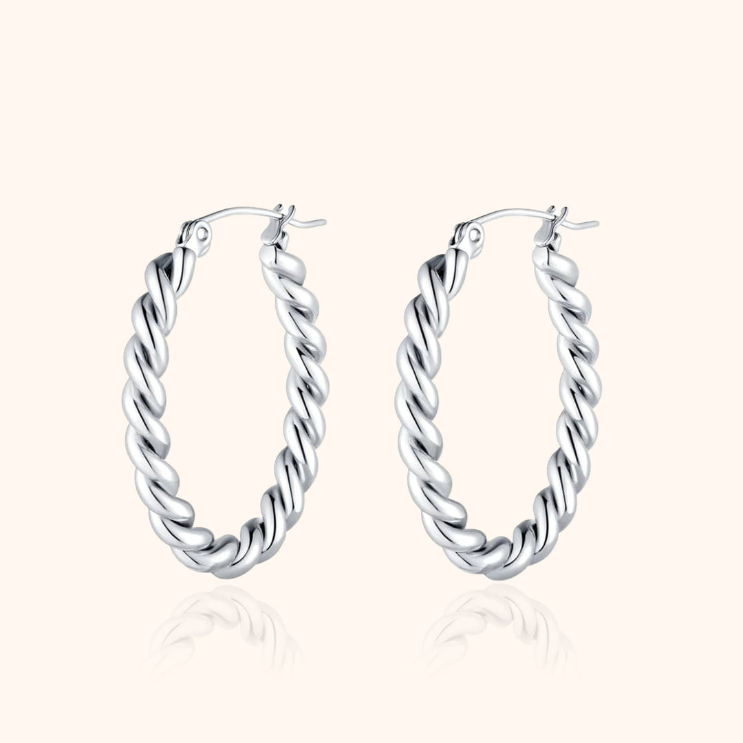Elegant women's braided hoop earrings in sterling silver & gold plated finish, perfect for stylish accessorizing.