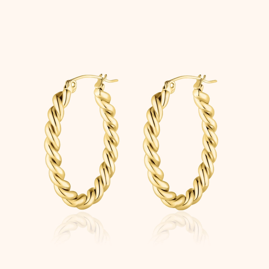 Fashionable sterling silver & gold plated braided hoop earrings for women, an elegant and timeless accessory.
