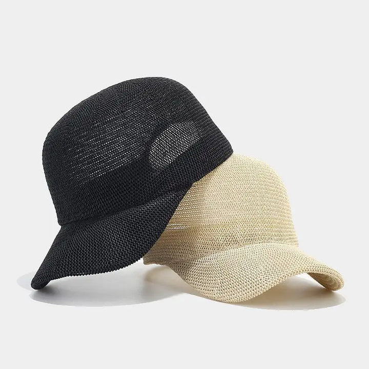 Fashionable braided sun hat for women, wide brim provides stylish UV protection for summer outings.