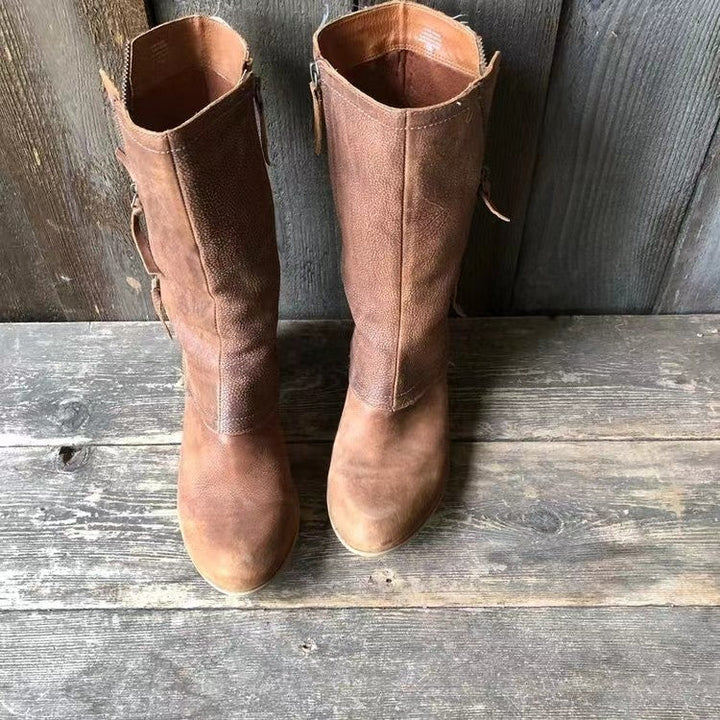 Stylish women's brown ankle boots, offering versatile comfort for casual or elegant fall outfits. Timeless design.