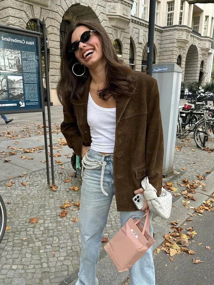 Elegant women's brown long-sleeve suede jacket with pockets, perfect for fall fashion & office wear.