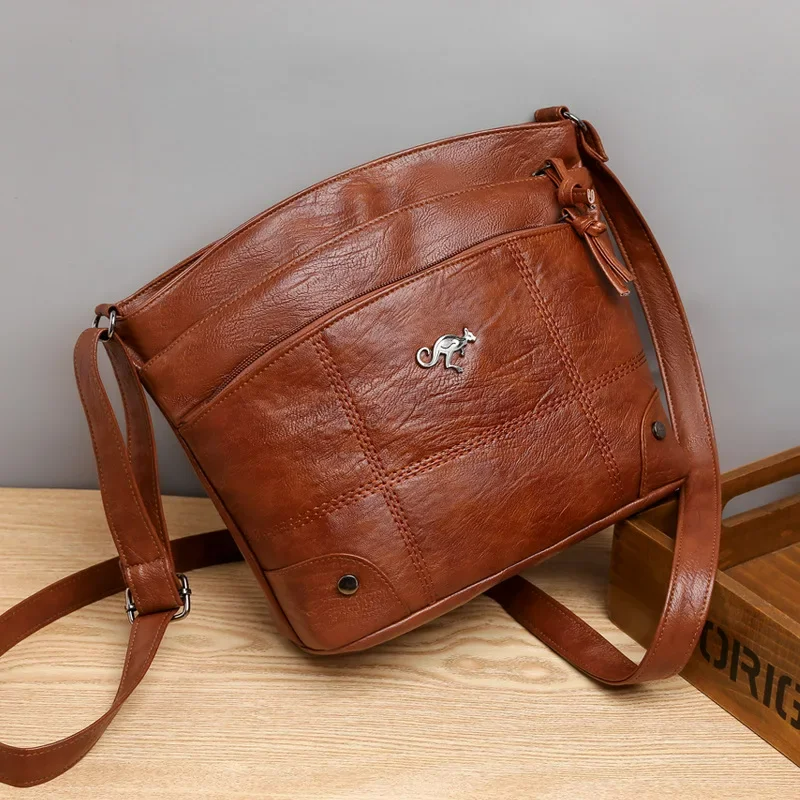 Elegant women's brown vegan leather shoulder bag, perfect for daily use & office. Chic & versatile handbag.