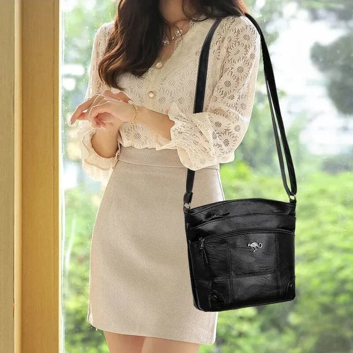 Smooth vegan leather women's shoulder bag, elegant & chic. Perfect daily or office handbag in brown.