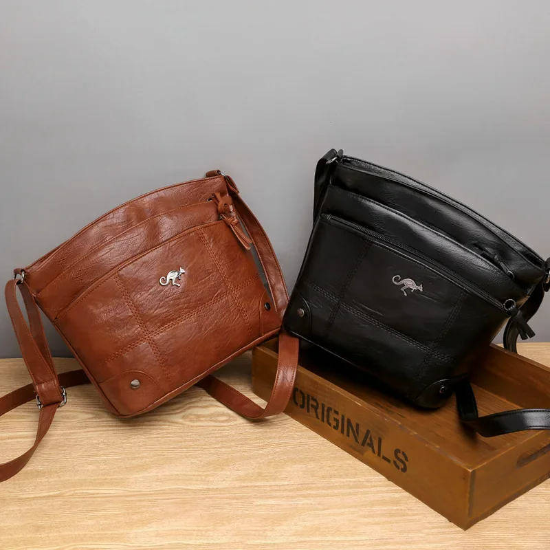 Women's elegant brown vegan leather shoulder bag. Chic, daily & office-ready handbag with versatile design.