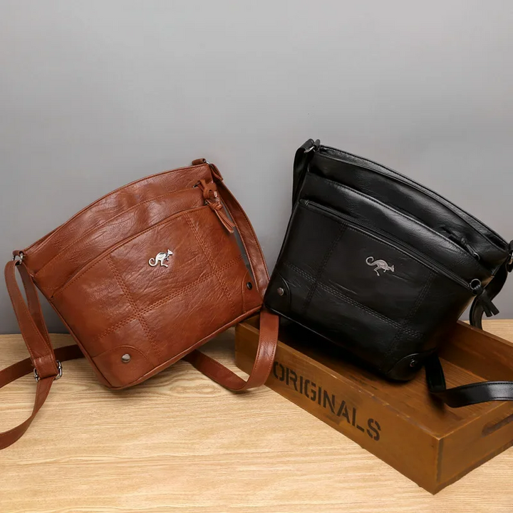 Women's elegant brown vegan leather shoulder bag. Chic, daily & office-ready handbag with versatile design.