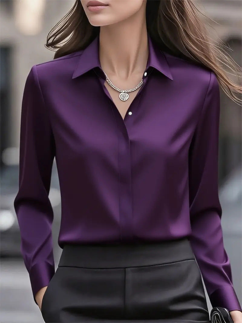 Chic and polished women's long-sleeve button blouse, an elegant top for versatile workwear style.