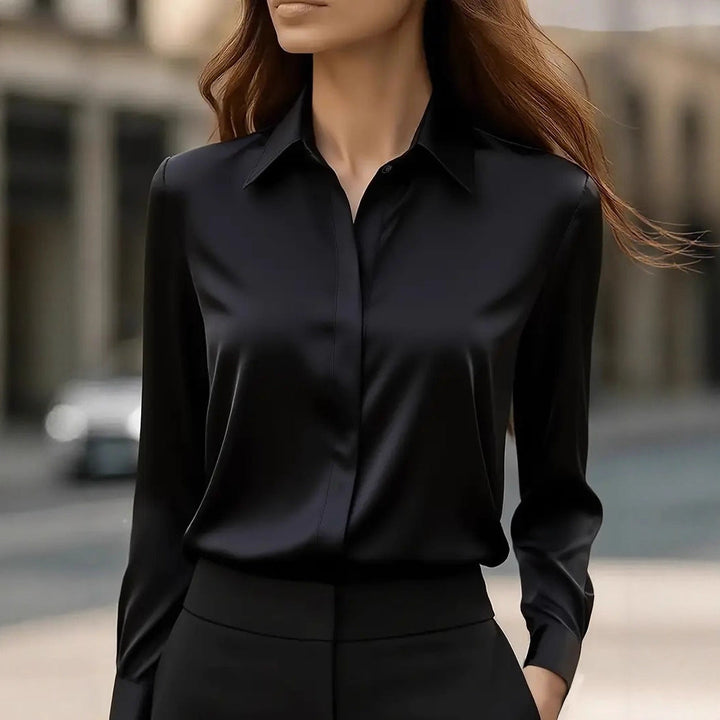 Classic women's elegant button blouse, a versatile long-sleeve top for any chic occasion.