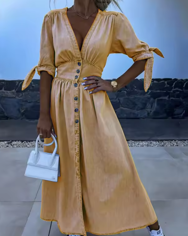 Chic women's short-sleeve button-down A-line dress. Casual yet elegant, offering comfortable & versatile everyday summer style.