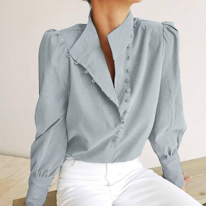 Fashionable women's button-front long sleeve blouse. A classy and elegant top for sophisticated workwear.