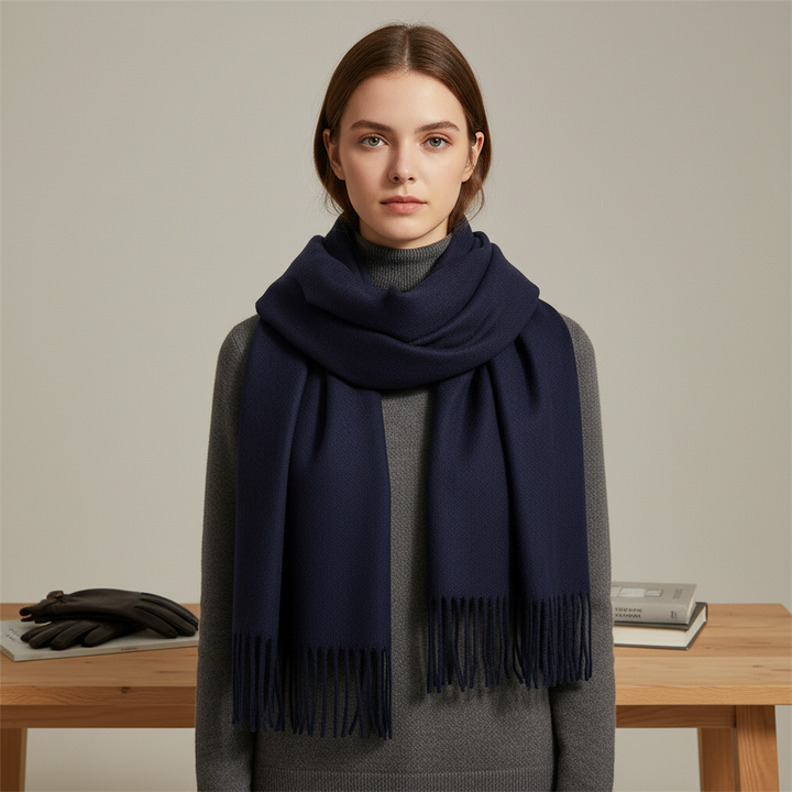 Elegant women's cashmere blend scarf with fringes, soft and warm for winter fashion.