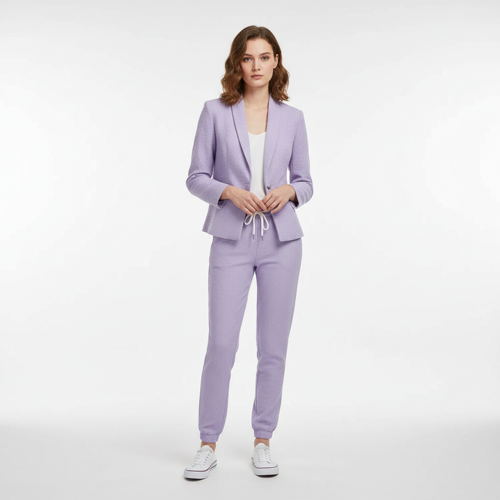 Stylish women's two-piece blazer and trouser set, versatile for office attire or casual wear